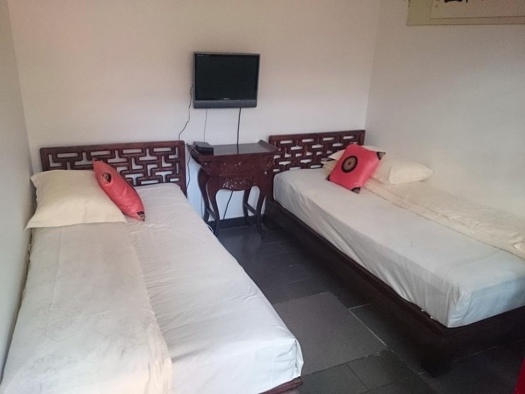 Templeside Deluxe Hutong Hotel Пекин Стая снимка
